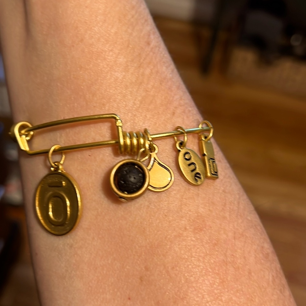 5 charm adjustable bracelet. The lava charm is a diffuser.